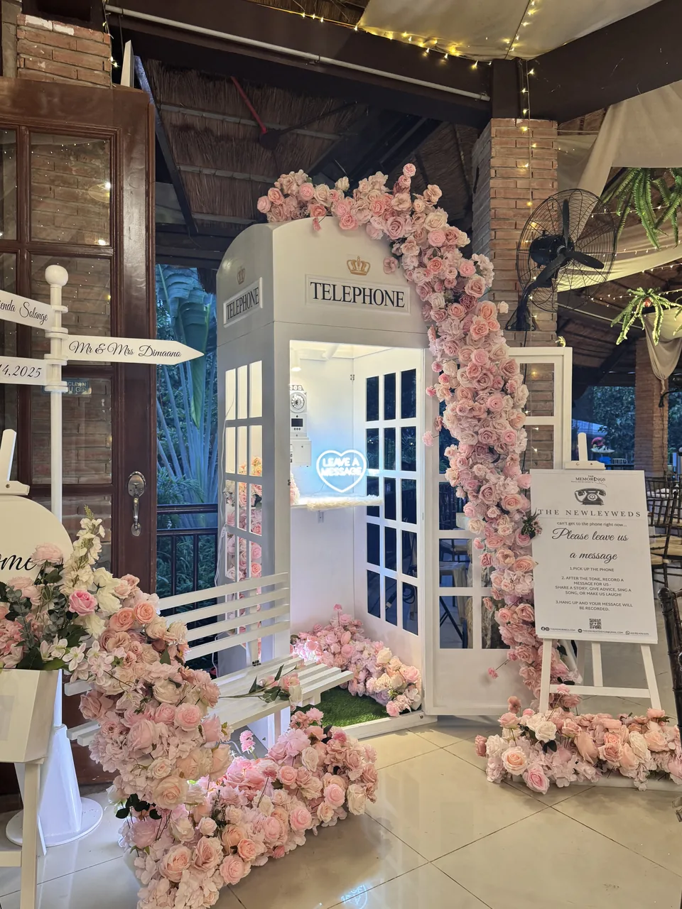 The Memorings floral booth styled inside a reception venue